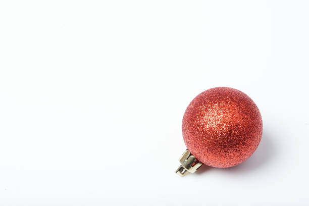 istock Close-Up Of Red Bauble Over White Background 928127706