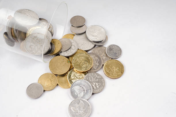 istock High Angle View Of Coins On White Background 928138426