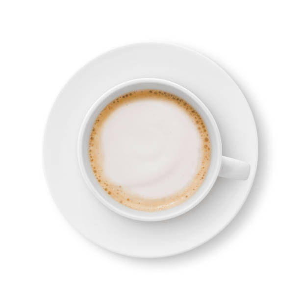 Cappuccino Coffee Cup and Saucer Top view of a cappuccino coffee cup and saucer isolated on white (excluding the shadow) frothy drink stock pictures, royalty-free photos & images