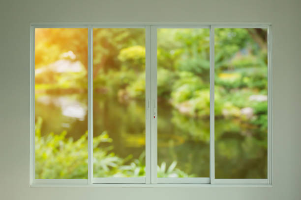 istock green garden view through the window 928153058