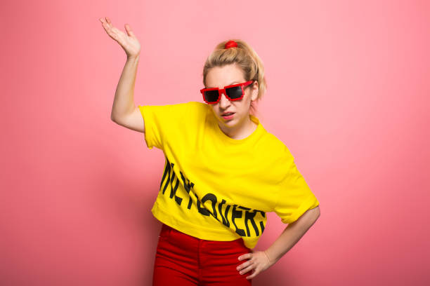 istock Blonde woman in bright clothes 928153390
