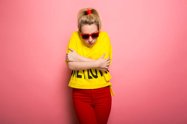 istock Blonde woman in bright clothes 928153392