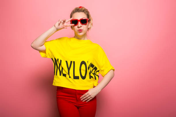 istock Blonde woman in bright clothes 928153398