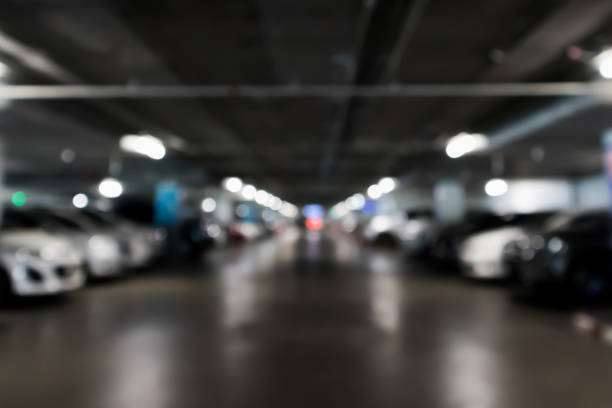 istock blur car parking abstract background 928153504