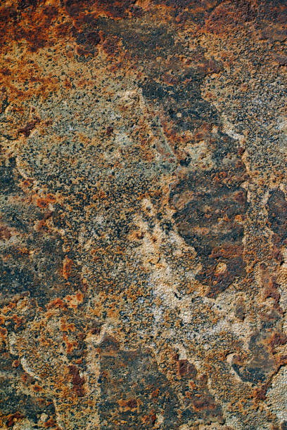 istock texture of rusty iron, cracked paint on an old metallic surface, sheet of rusty metal with cracked and flaky paint,  corrosion, decay metal background, decay steel, decay 928153676