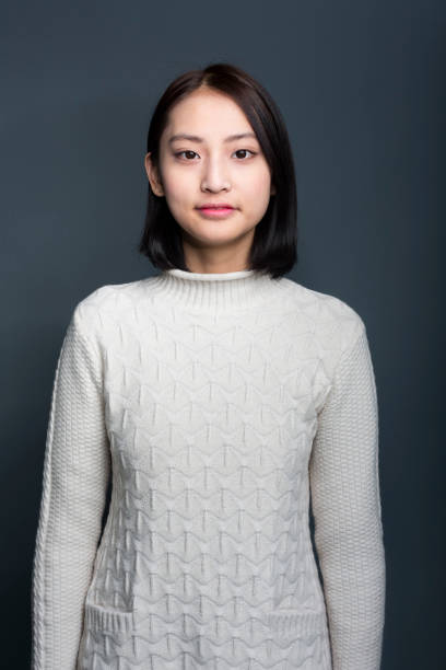 istock young asian female,portrait 928154602