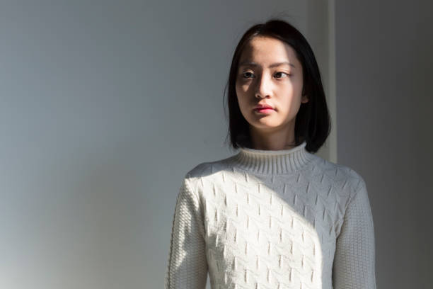 istock shadow of young woman,portrait 928155168