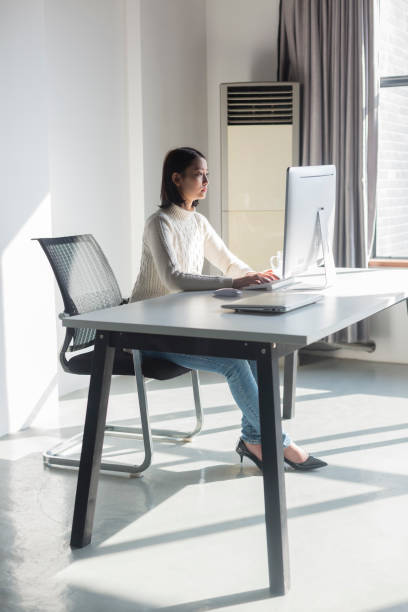 istock young woman working on computer in home office 928157878