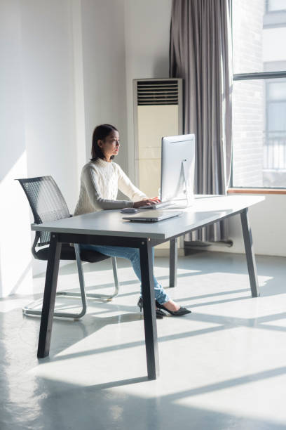 istock young woman working on computer in home office 928158016