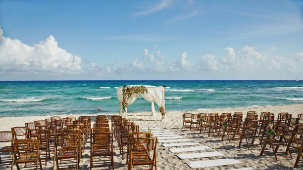 Wedding setup on the beach in Mexico Chairs and wedding setup on the white sand Mexico with the ocean in the background destination wedding stock pictures, royalty-free photos & images