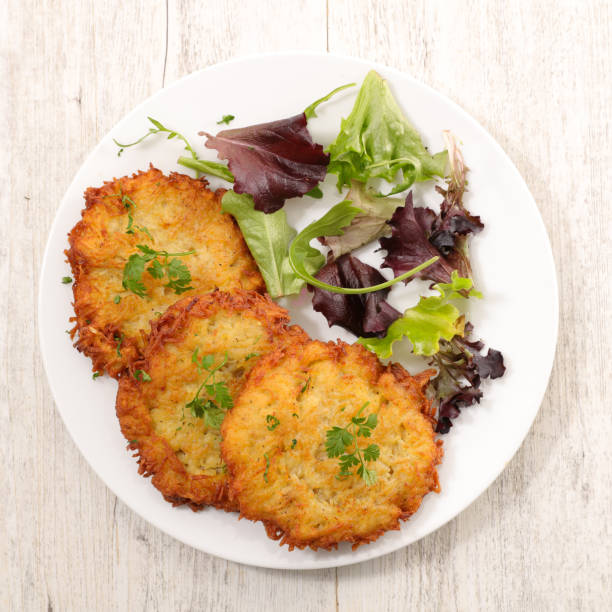 istock fried potato galette and salad 928161638