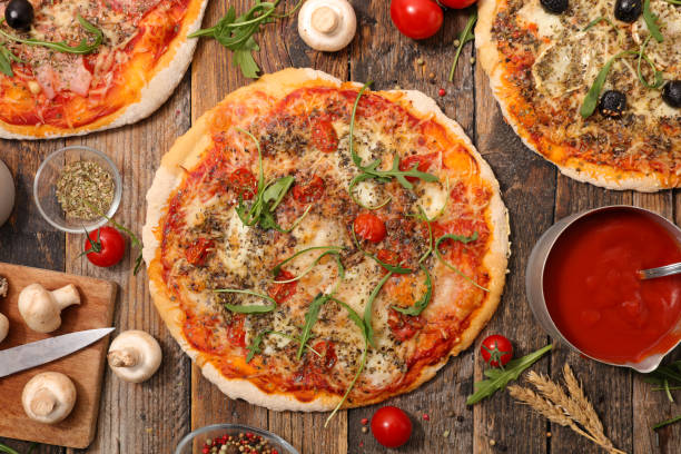istock homemade pizza on wood background 928161744