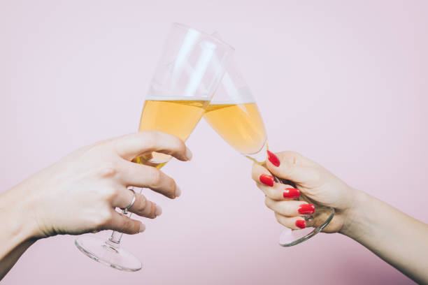 istock Close up of Two woman hands making good cheer 928162142