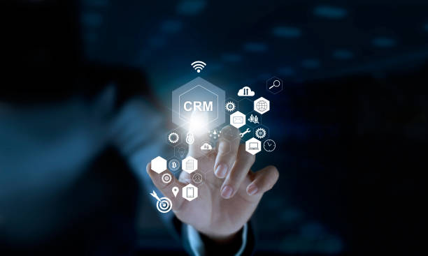 businessman touching icon crm on modern virtual interface. customer relationship management (crm) concept. - setup operator imagens e fotografias de stock