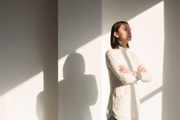 istock shadow of young woman,portrait 928166828