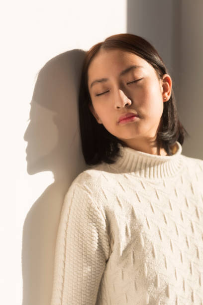 istock shadow of young woman,portrait 928166948