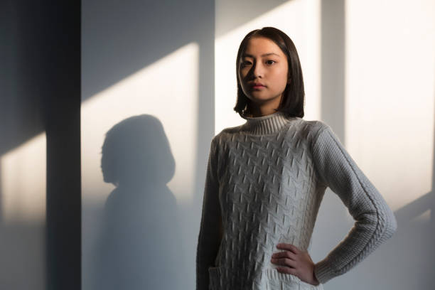 istock shadow of young woman,portrait 928169552