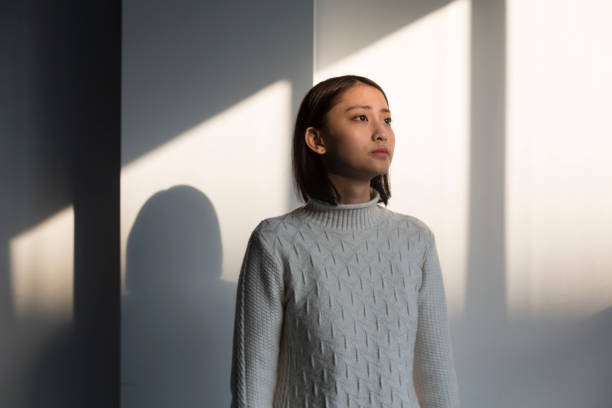 istock shadow of young woman,portrait 928169556