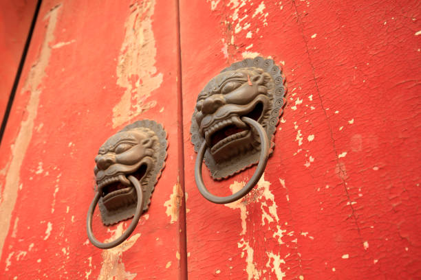 istock Ancient Chinese architecture copper door knocker 928173102