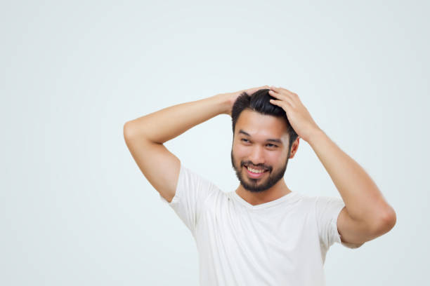 istock Asian handsome man with a mustache, smiling and laughing isolated on white background 928173314