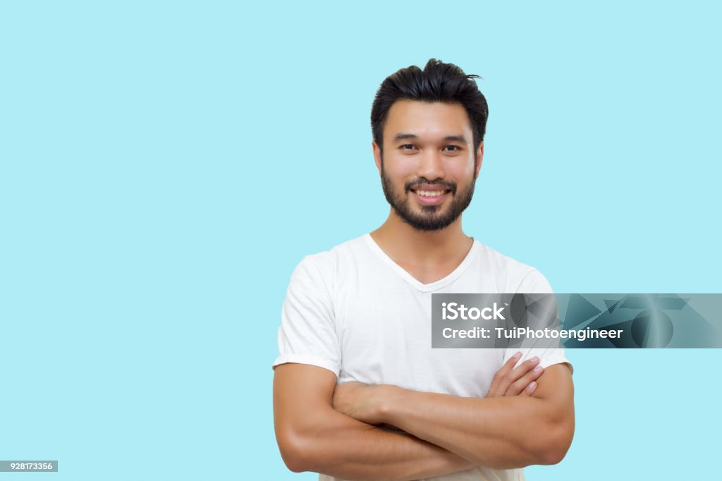 Asian handsome man with a mustache, smiling and laughing isolated on white background Men Stock Photo