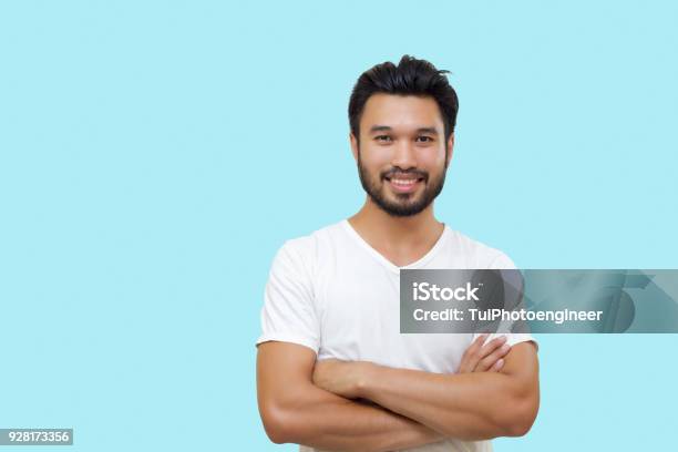 Asian Handsome Man With A Mustache Smiling And Laughing Isolated On White Background Stock Photo - Download Image Now
