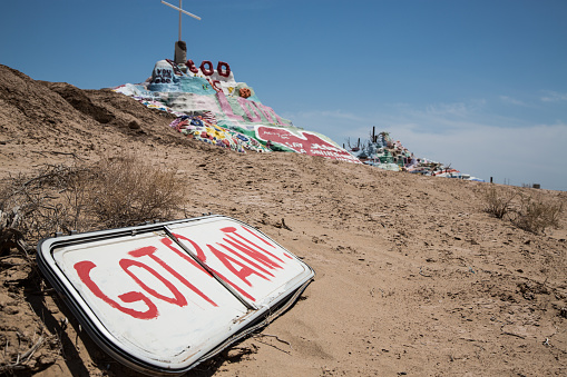 Salvation Mountain, Niland, California - May 08, 2014:  Salvation Mountain is a visionary environment covering a hill in the Colorado Desert, north of Calipatria, northeast of Niland near Slab City, several miles from the Salton Sea. It is in Imperial County, California.  It was envisioned and built by Leonard Knight who built it over 20 years.   He built it in response to a message he felt he had heard from God.  Leonard died 3 months before these photos were taken.  He was 82.