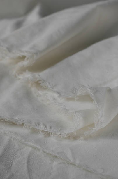 istock Texture of Crumpled White Calico Fabric. 928177162