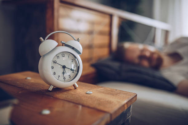 Almost time to wake up One man, ginger man sleeping tight, getting up early soon. its almost time stock pictures, royalty-free photos & images