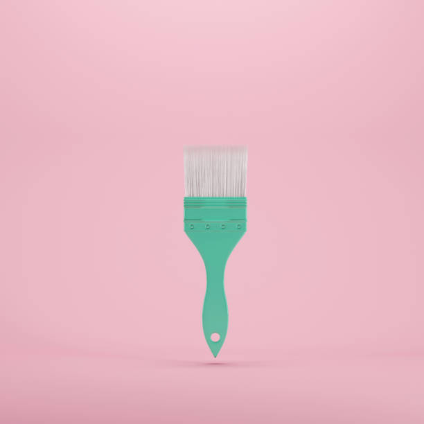 istock paint brush floating on pastel color background. minimal idea concept. 928181338