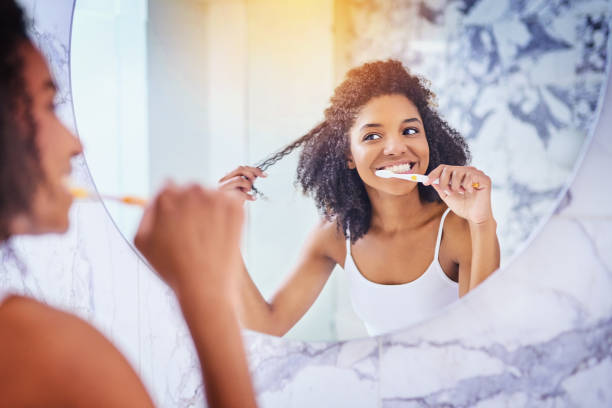 istock Brushing her way to a bright smile 928192376