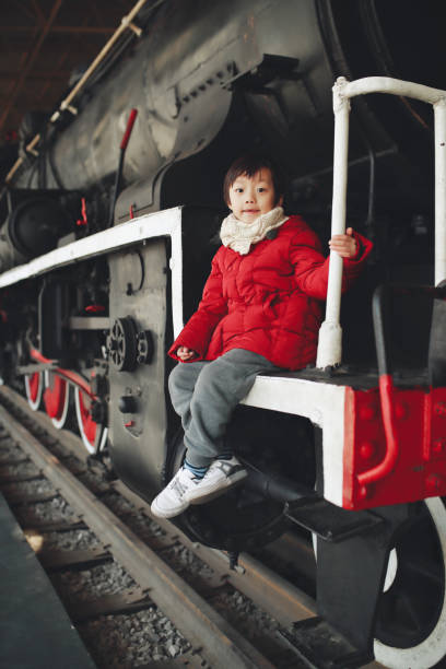 istock The children play on the track 928197028