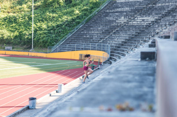 istock Female Athlete Cross Training at Stadium 928209952