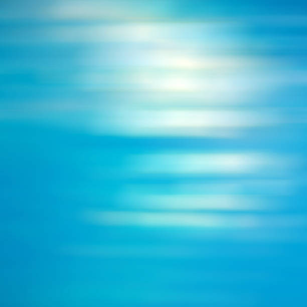 istock Soft focus bokeh light effects over a rippled, blue water background in the pool 928212832