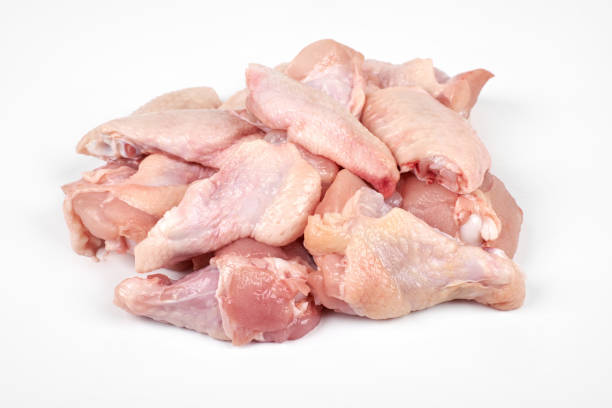 istock Raw chicken wings isolated on white background 928215170