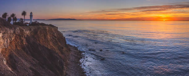 Beautiful Point Vicente Lighthouse at Sunset Panorama Beautiful panoramic view of Point Vicente Lighthouse atop the steep cliffs of Rancho Palos Verdes, California at sunset rancho palos verdes stock pictures, royalty-free photos & images