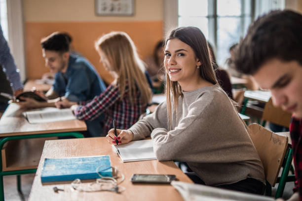 istock Happy high school student learning in the classroom. 928229888