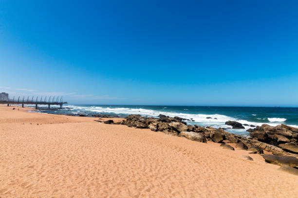 istock Beach Pier Sea against Blue Sky Coastal Landscape 928230170