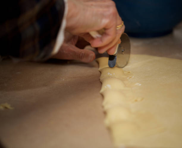 istock Senior woman is preparing homemade pasta. 928230484
