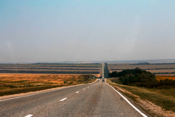 istock Wide highway and mountain. North Caucasus travel. 928235666