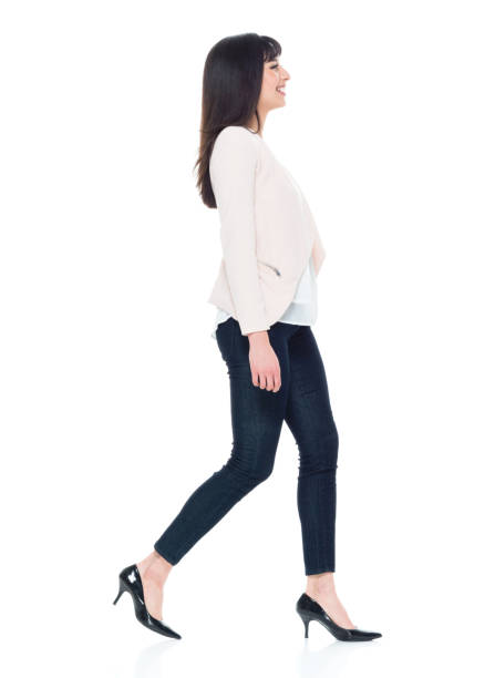 istock Attractive young businesswoman walking 928239374