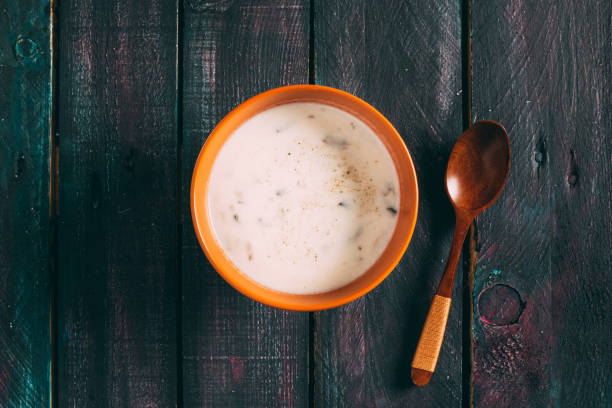 istock Mushroom Soup on Wooden Table 928242716