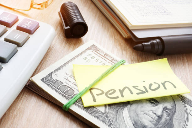 istock Memo with word pension on a  money. Retirement plan. 928243696