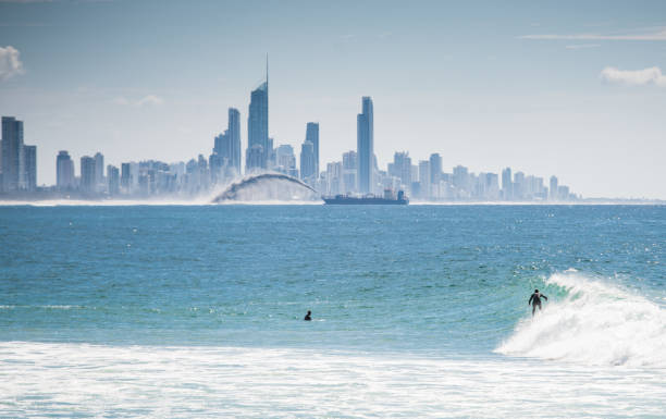 istock Gold Coast sand dredging and surfers 928246448