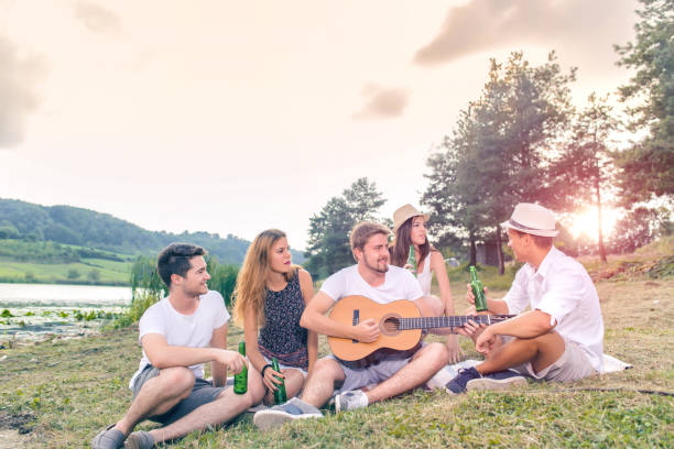 istock Happy Young people having party outdoor 928248094