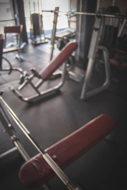 istock Blurred gym background with equipment for workout 928251094
