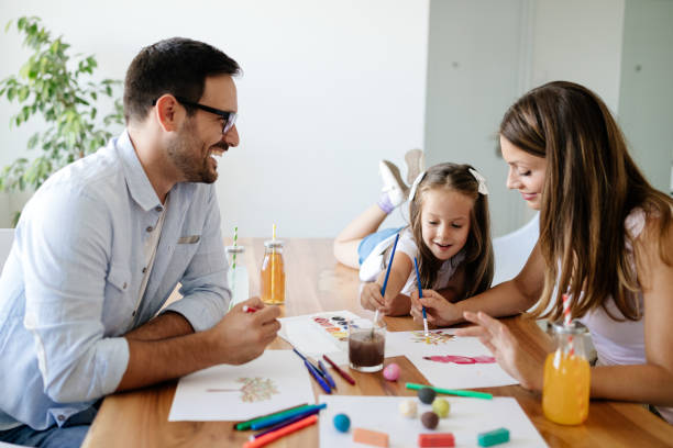 istock Happy familiy spending fun time at home 928252566