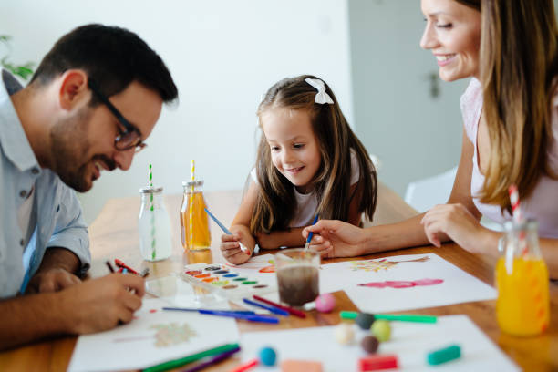 istock Happy familiy spending fun time at home 928254946