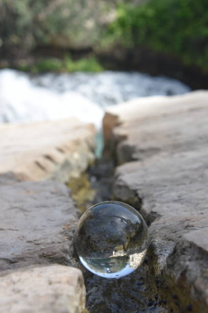 istock River crevice through a crystal ball 928255142