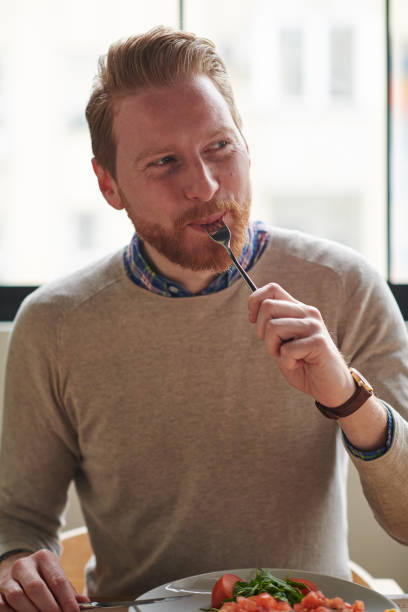 istock Young man enjoying healthy breakfast 928266838